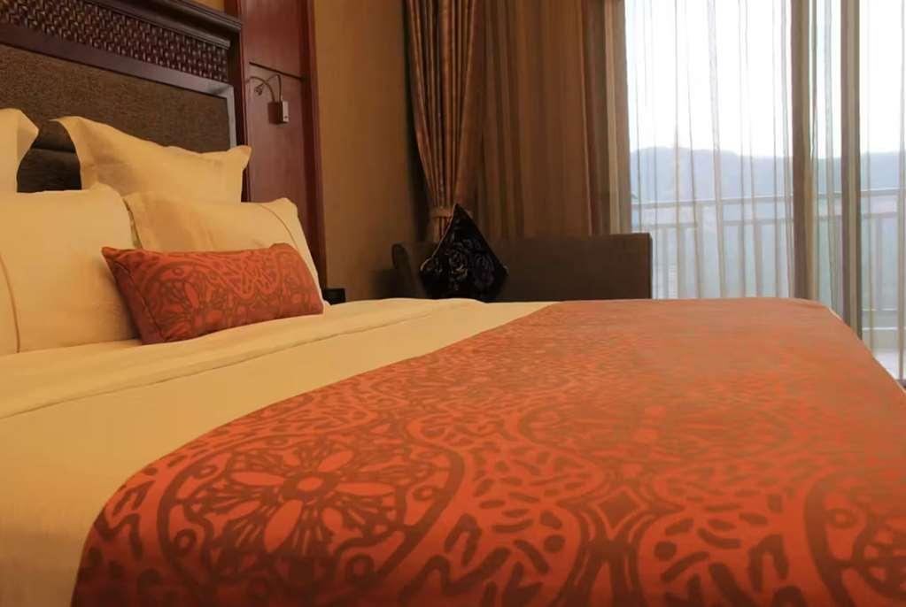 Hotel Ramada Plaza Xishuangbanna Habitación foto