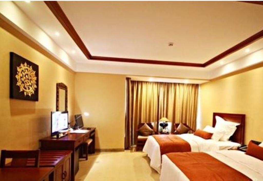 Hotel Ramada Plaza Xishuangbanna Exterior foto