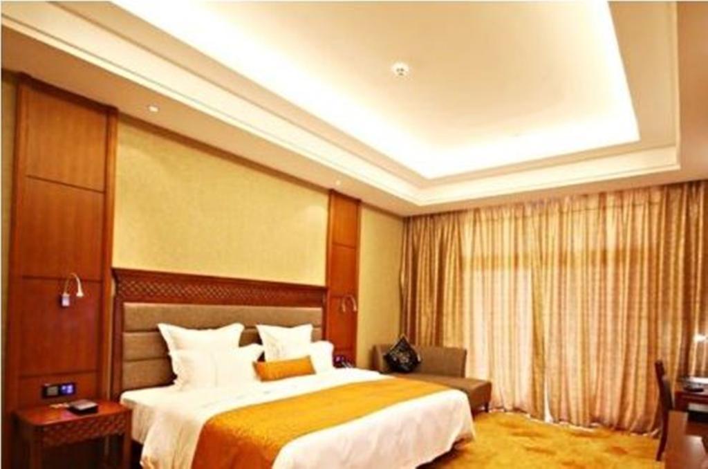 Hotel Ramada Plaza Xishuangbanna Exterior foto