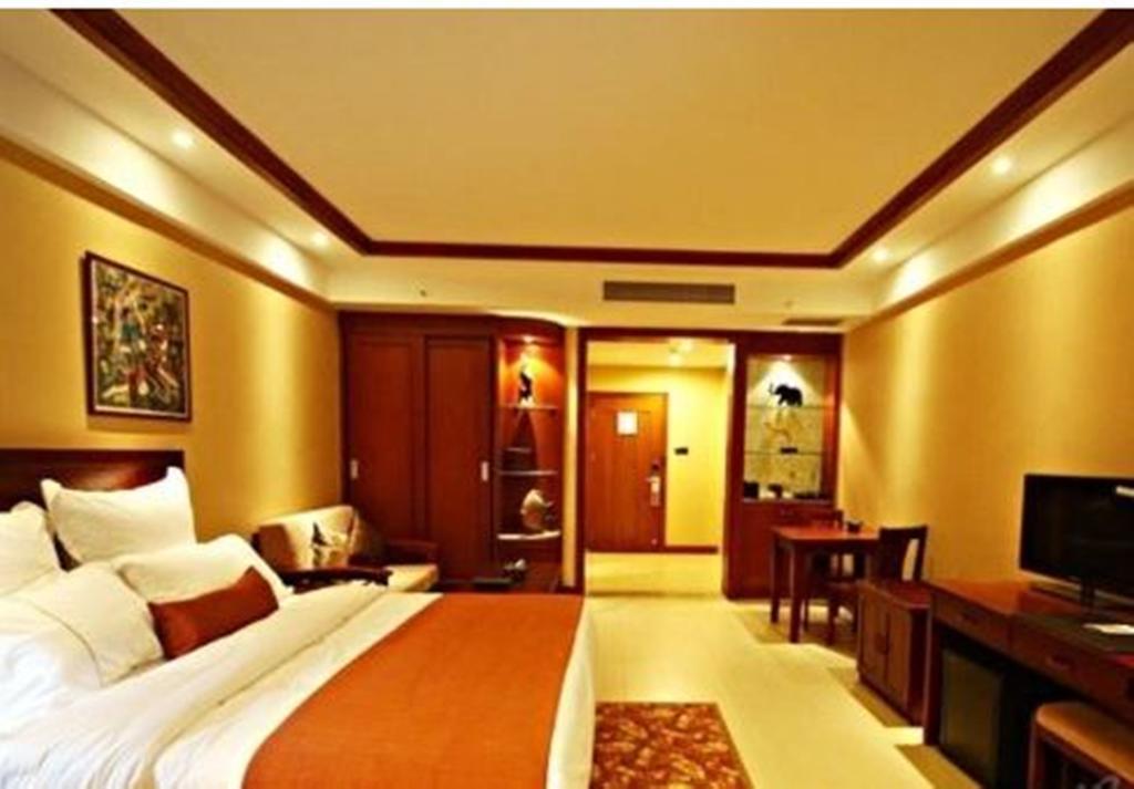 Hotel Ramada Plaza Xishuangbanna Exterior foto