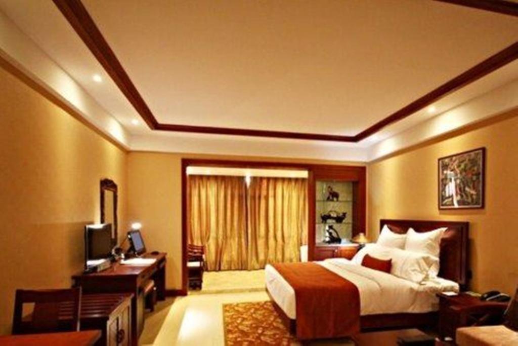 Hotel Ramada Plaza Xishuangbanna Exterior foto