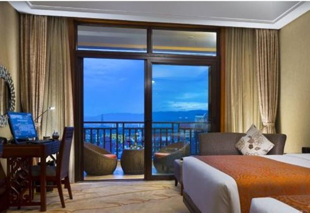 Hotel Ramada Plaza Xishuangbanna Exterior foto