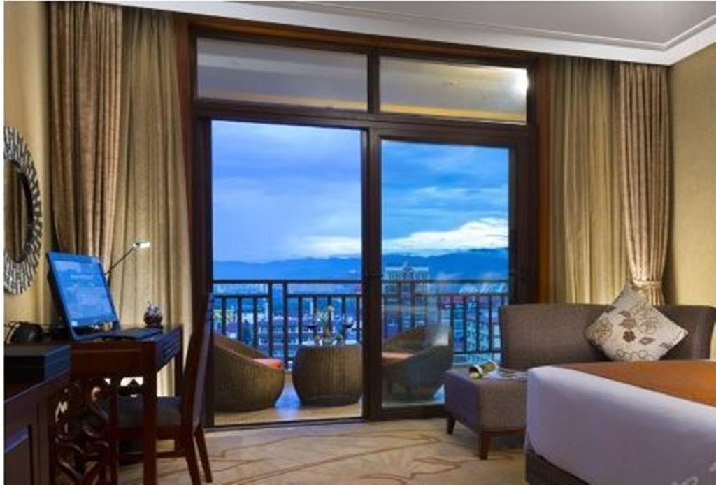 Hotel Ramada Plaza Xishuangbanna Exterior foto
