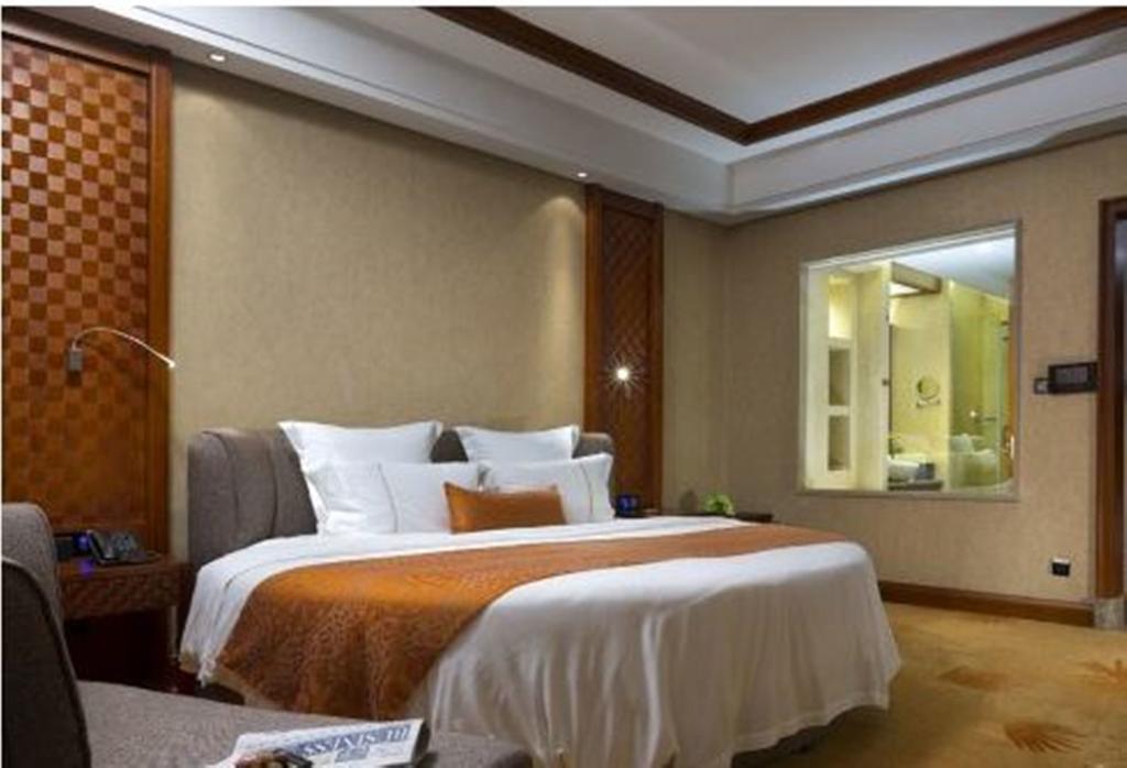 Hotel Ramada Plaza Xishuangbanna Exterior foto