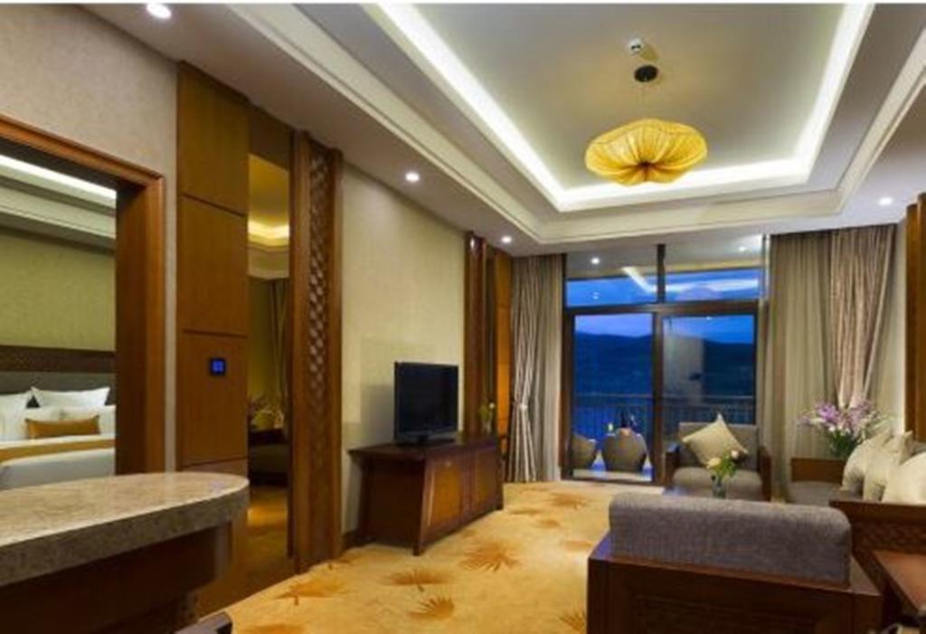 Hotel Ramada Plaza Xishuangbanna Exterior foto
