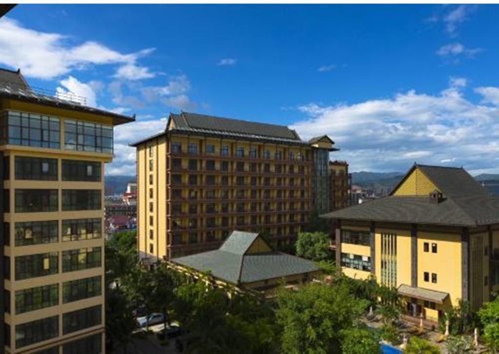 Hotel Ramada Plaza Xishuangbanna Exterior foto
