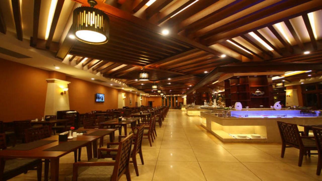 Hotel Ramada Plaza Xishuangbanna Exterior foto